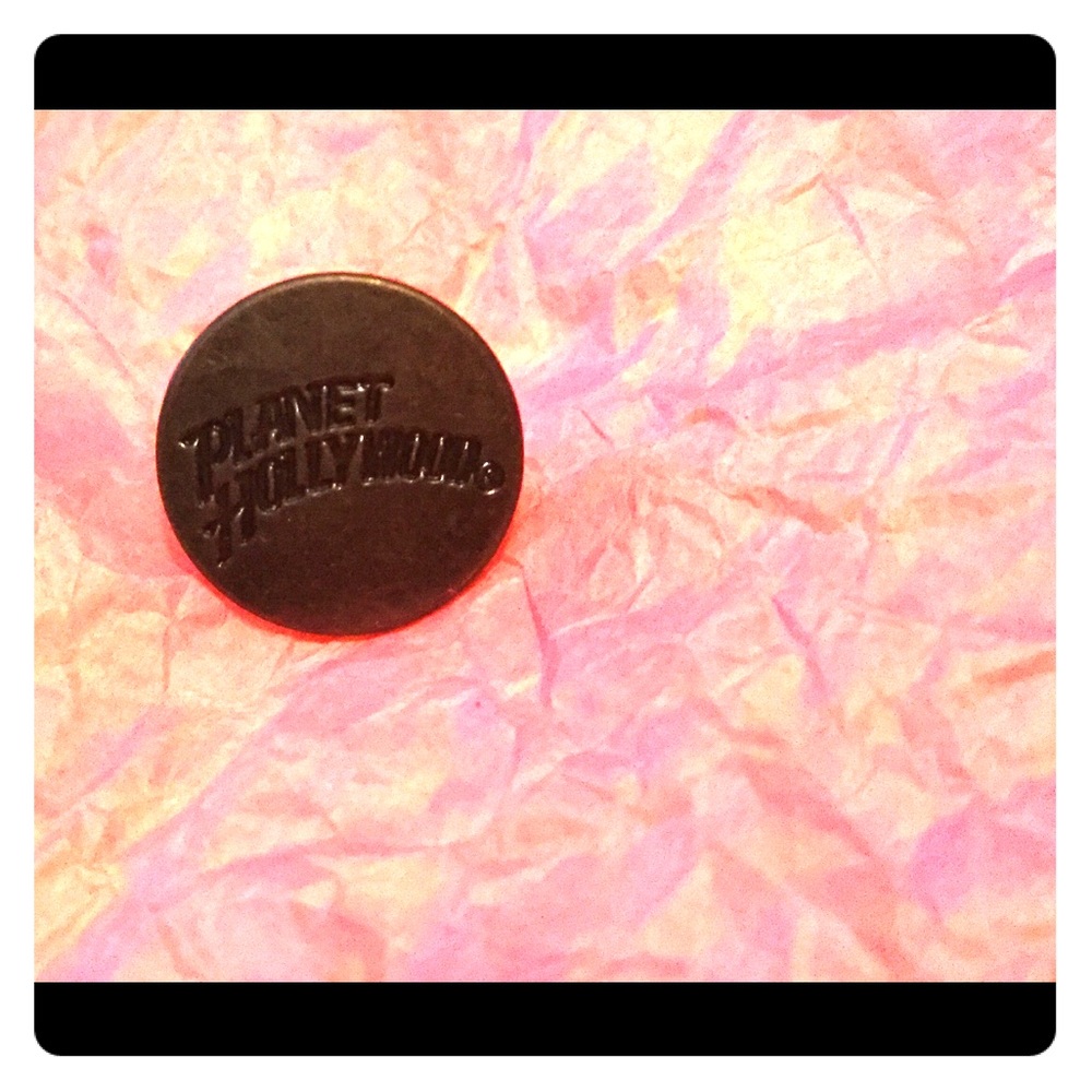 Authentic Planet Hollywood rivet buttons.